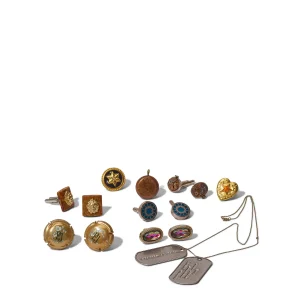 A GROUP OF CUFFLINKS, BUTTON COVERS, AND JEWELRY
